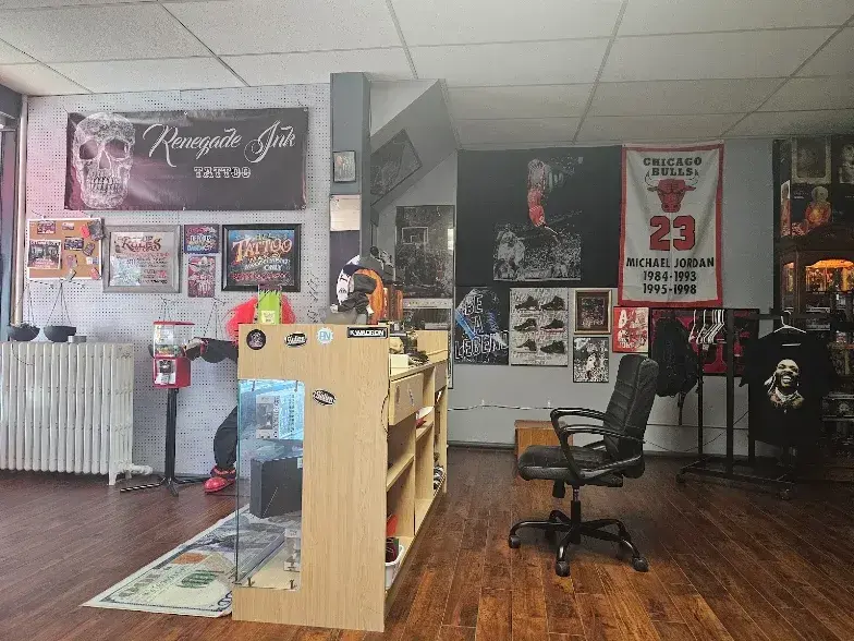 The front counter and tattoo artwork inside Renegade Ink